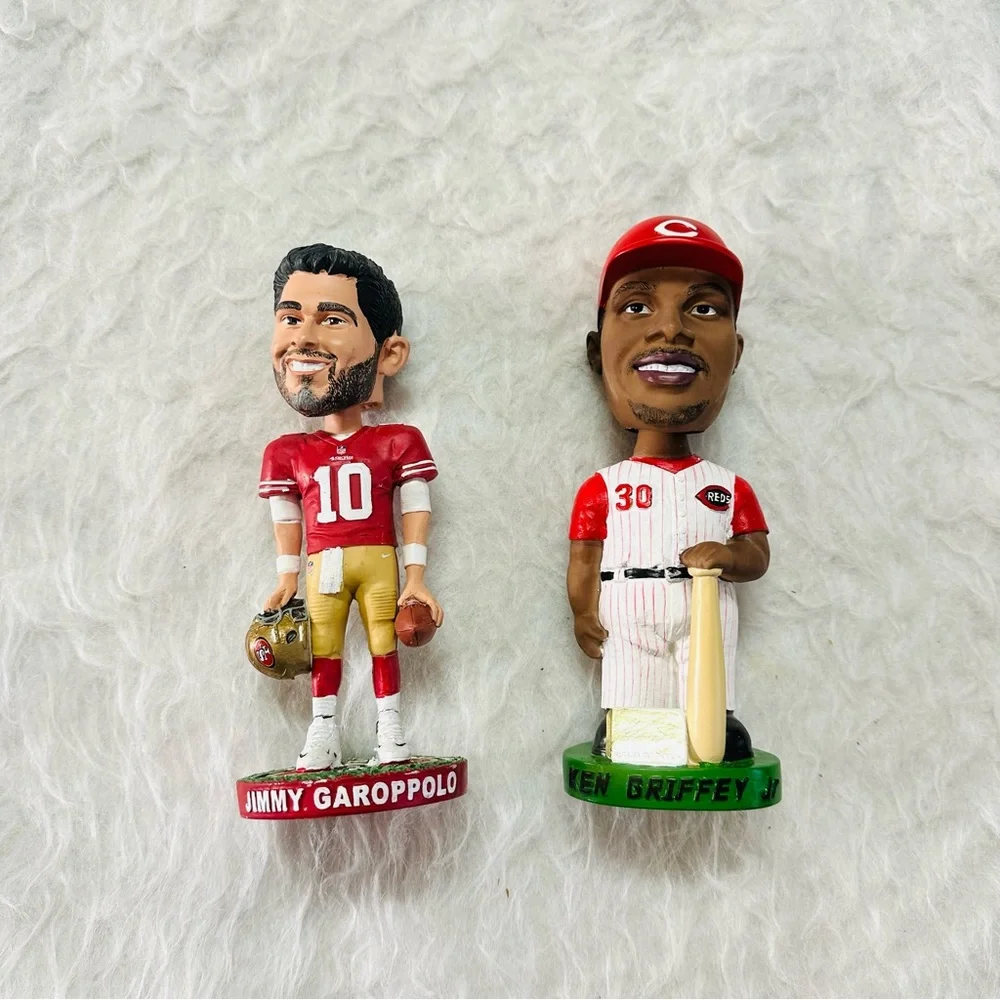 Sports-Themed Bobblehead Set - Red and White 70% good.